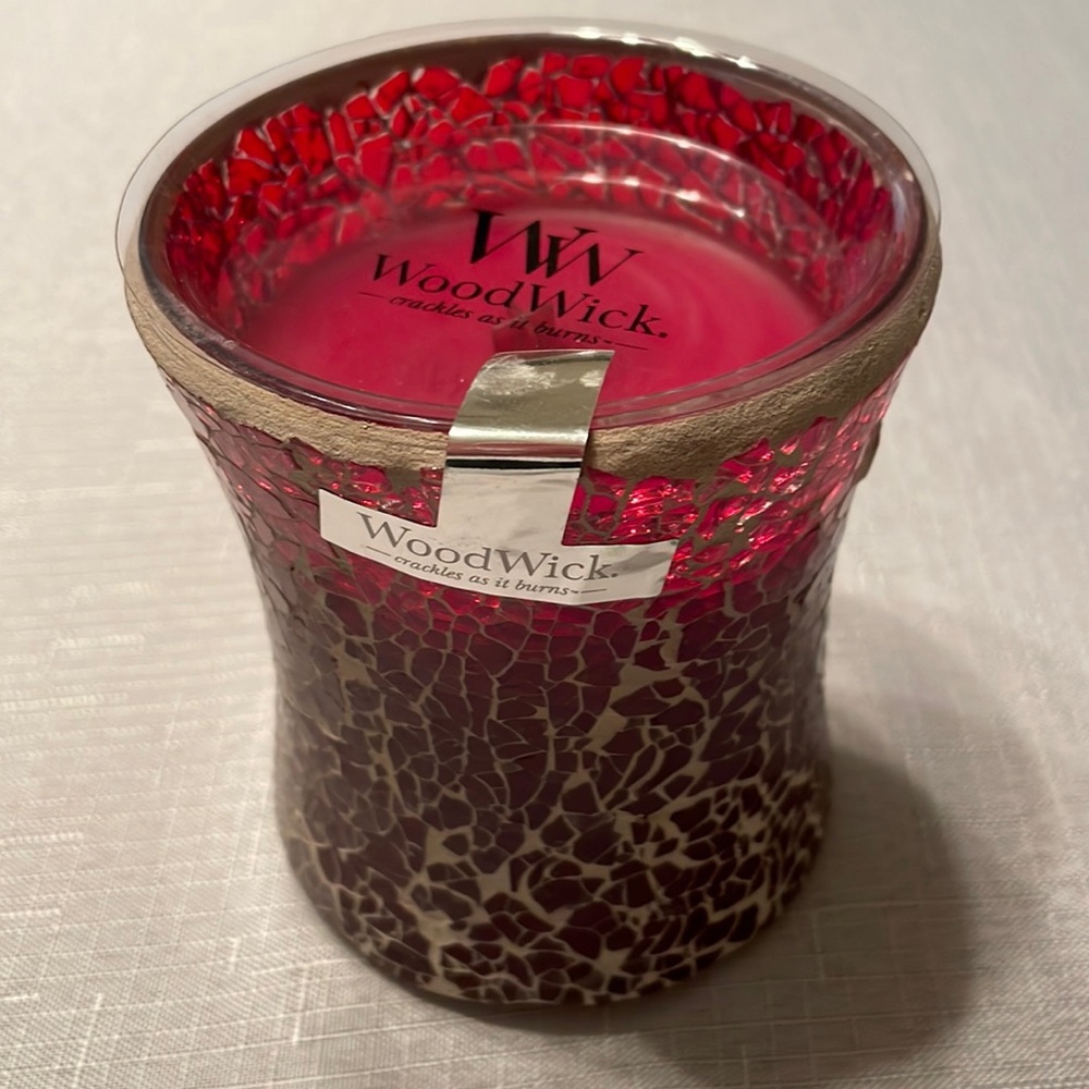 WoodWick crackles as it burns candle. New.  Never burned.